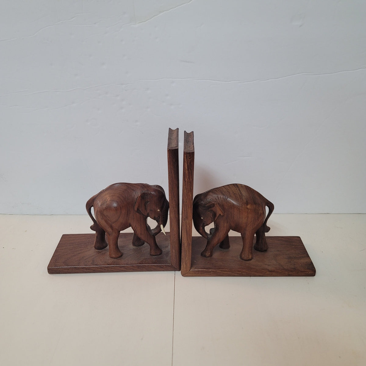 Vintage Wood elephant with tusk bookends wood pair