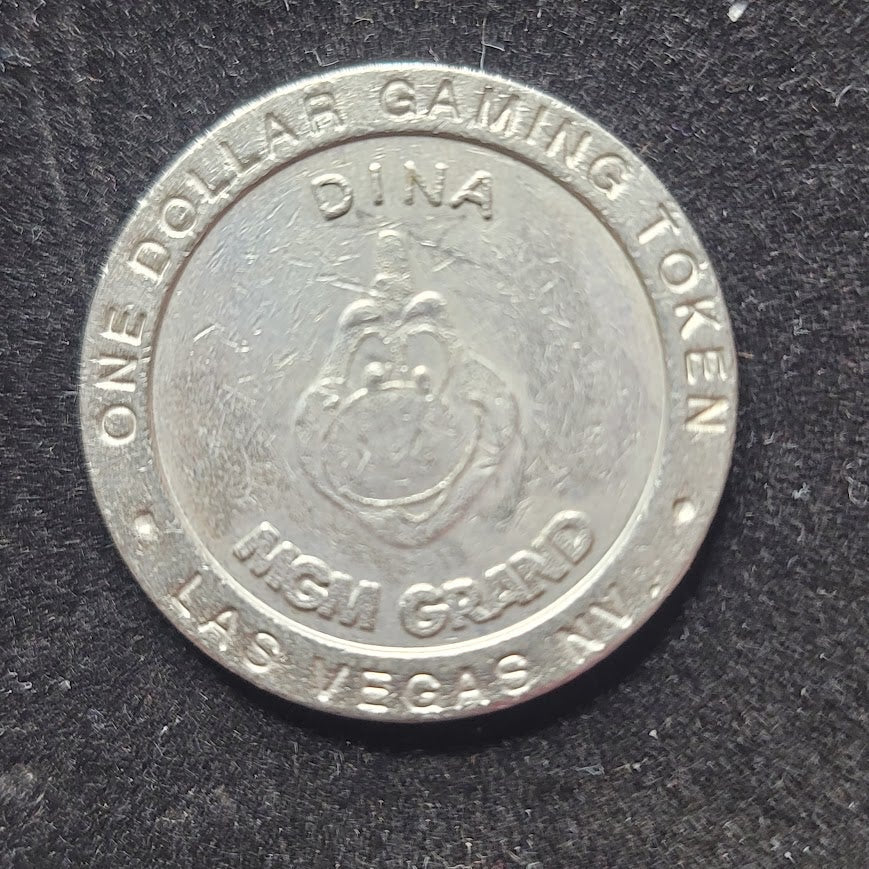 1993 MGM Grand Dina one dollar gaming token Metal Las Vegas NVD