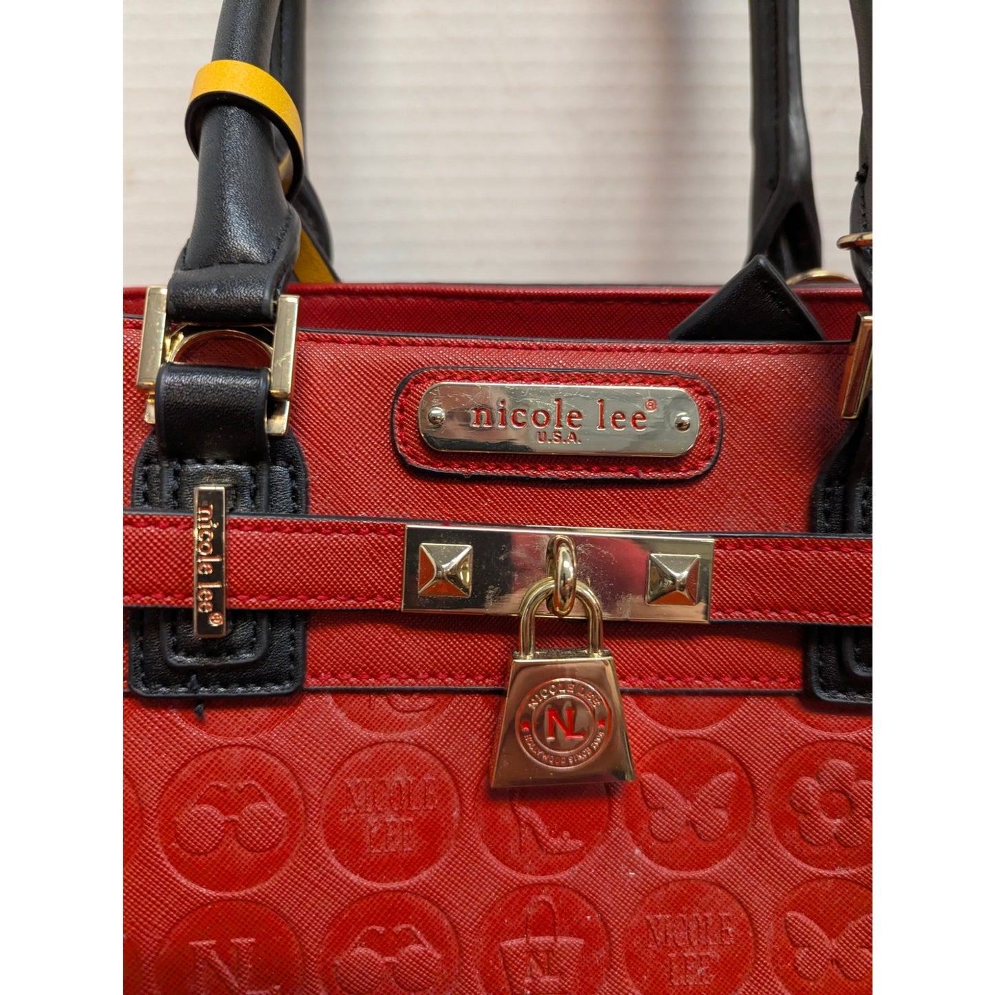 Nicole Lee Crimson Red Embossed Satchel Gold Padlock Detail