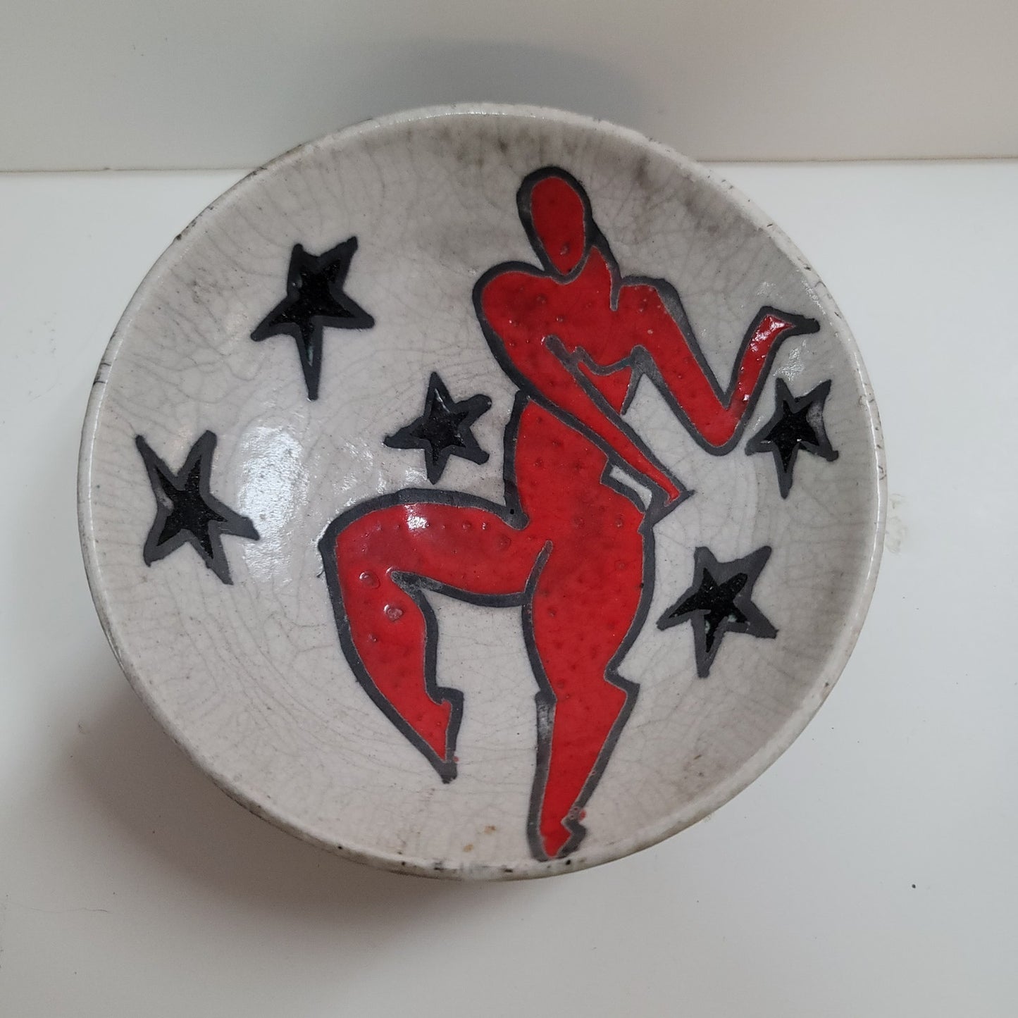 Art pottery female nude red surrounded by stars signed MAB wall decor bowl red