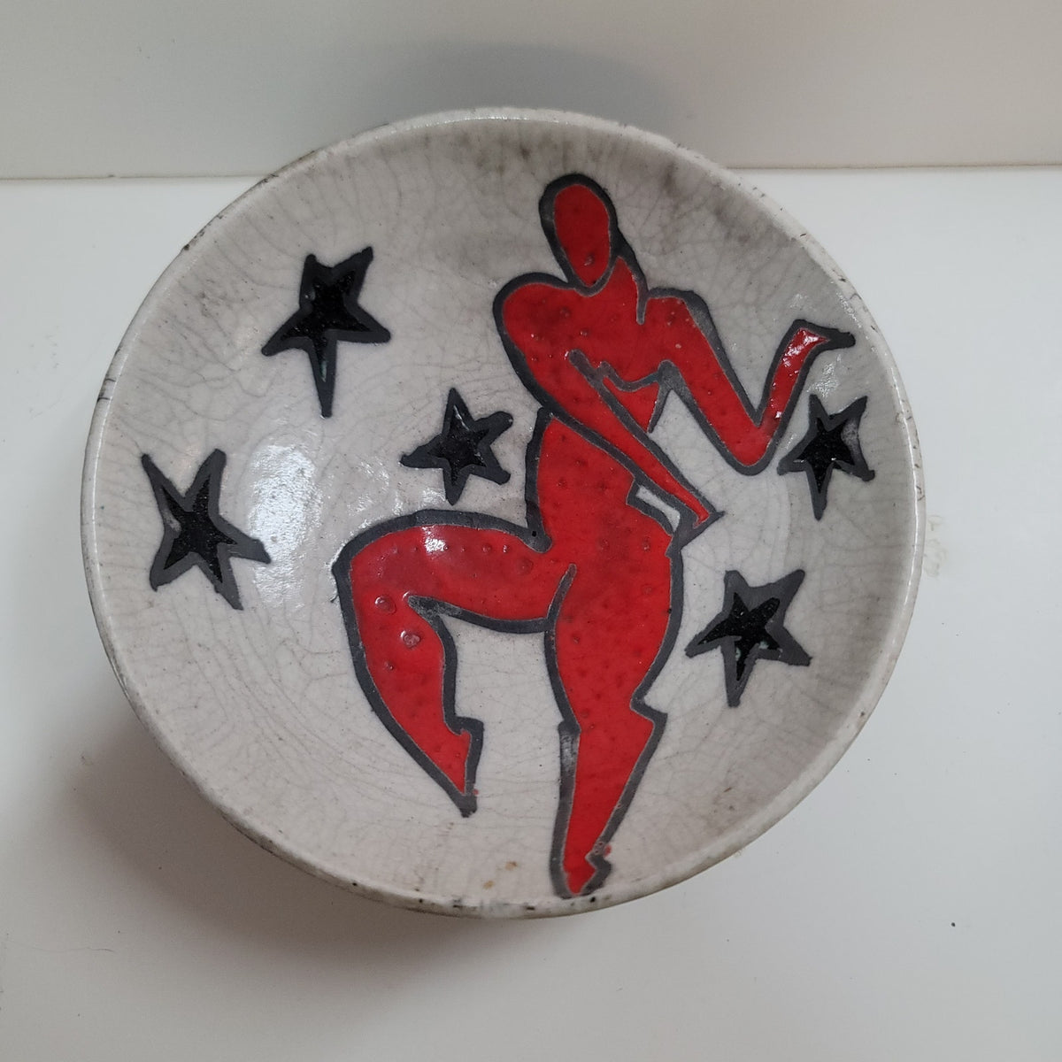 Art pottery female nude red surrounded by stars signed MAB wall decor bowl red