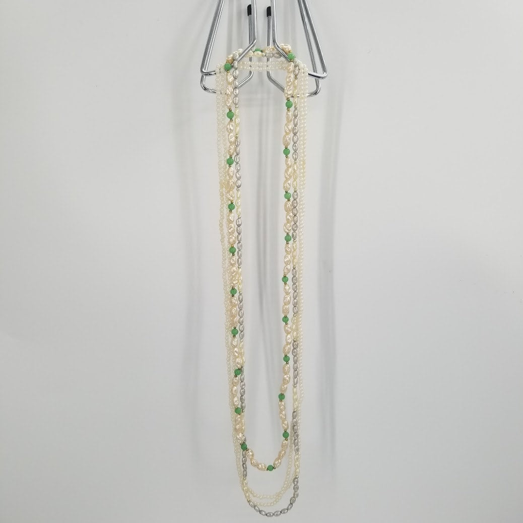 4 strands of necklaces fresh water pearl and small round plastic beads