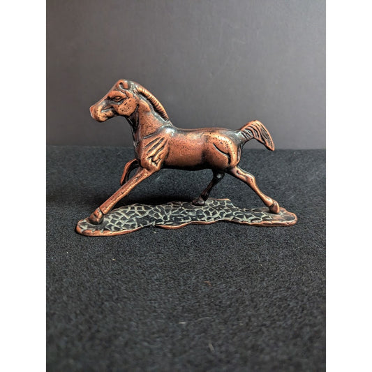 Vintage copper-colored 7" horse figurine on hammered metal stand