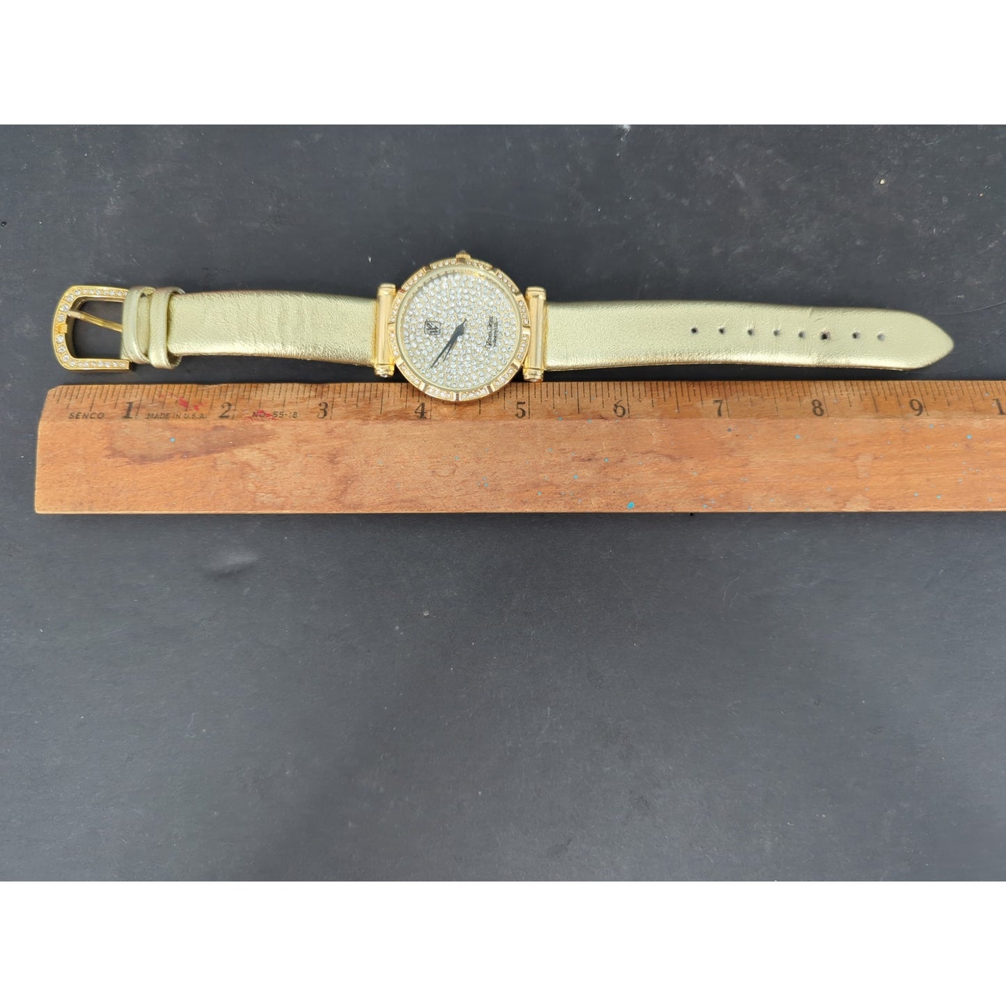 Vtg. Victoria Wieck Beverly Hills Gold Tone Crystal Pave Watch Gold Leather Band