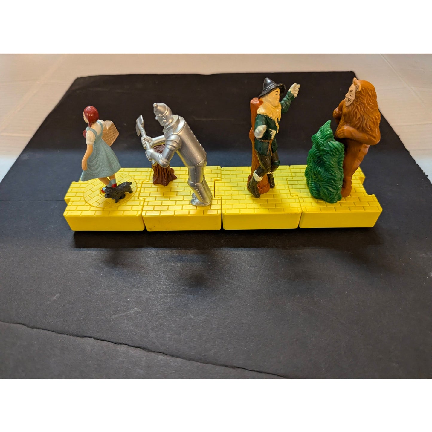 Vintage 1998 Blockbuster Wizard of Oz Interlocking Yellow Brick Road Figure Set of 4