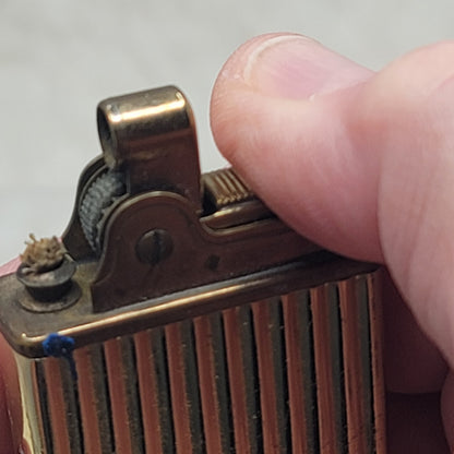 Vintage Ribbed Gold Mechanical Music Box Pocket Lighter Japan Smoke Gets In Eyes