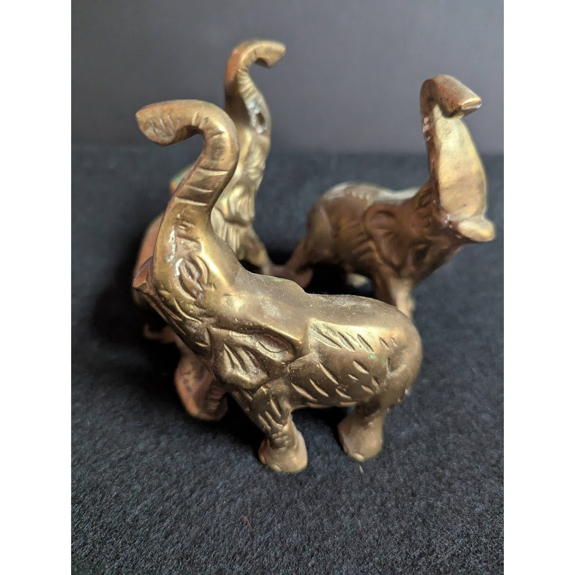 Small vintage bronze ring of 3 elephants trunks raised all attached