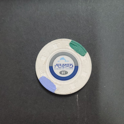 Casino Chip ATLANTIS PARADISE ISLAND $1 gaming white blue green dolphin