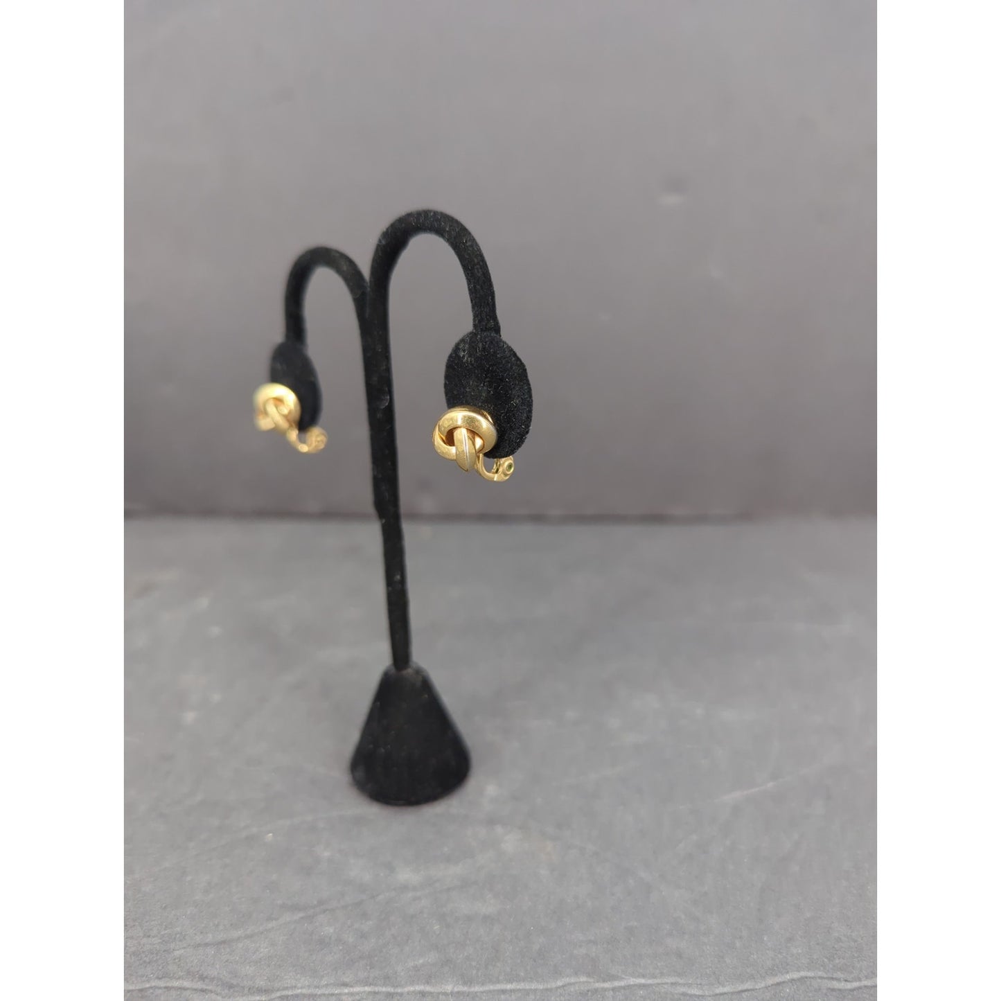 Vintage Mid-Century Monet Gold Tone Swirl Love Knot Clip-On Earrings Classic
