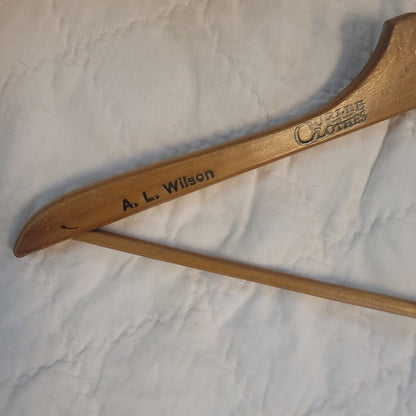 A.L. Wilson Adversting wood clothes hanger Curlee Clothes Quincy, Florida