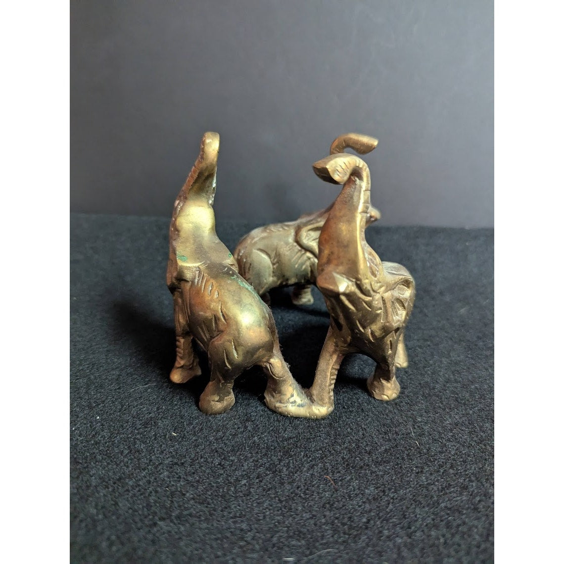 Small vintage bronze ring of 3 elephants trunks raised all attached