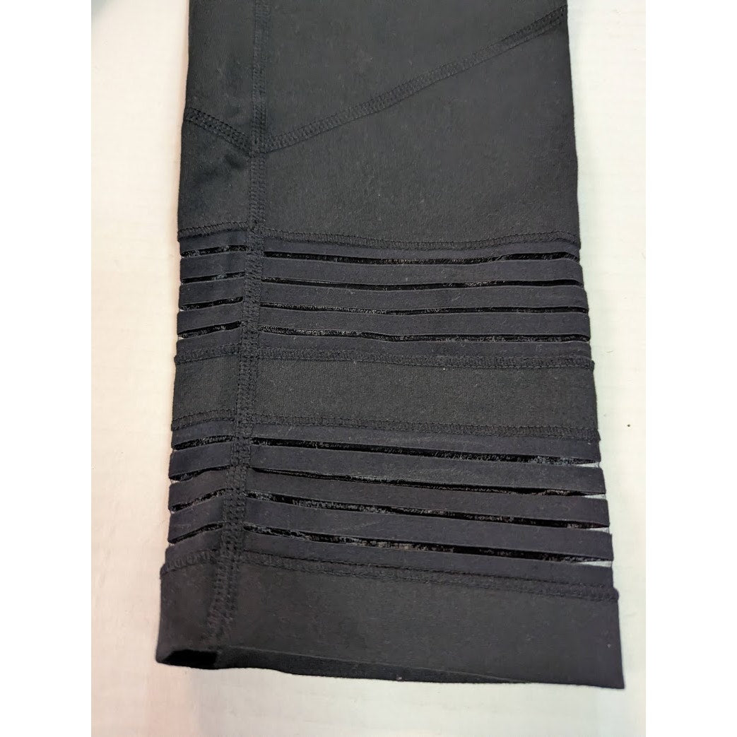 Zella Black high waist capri leggings black size Small striped detail vents calf
