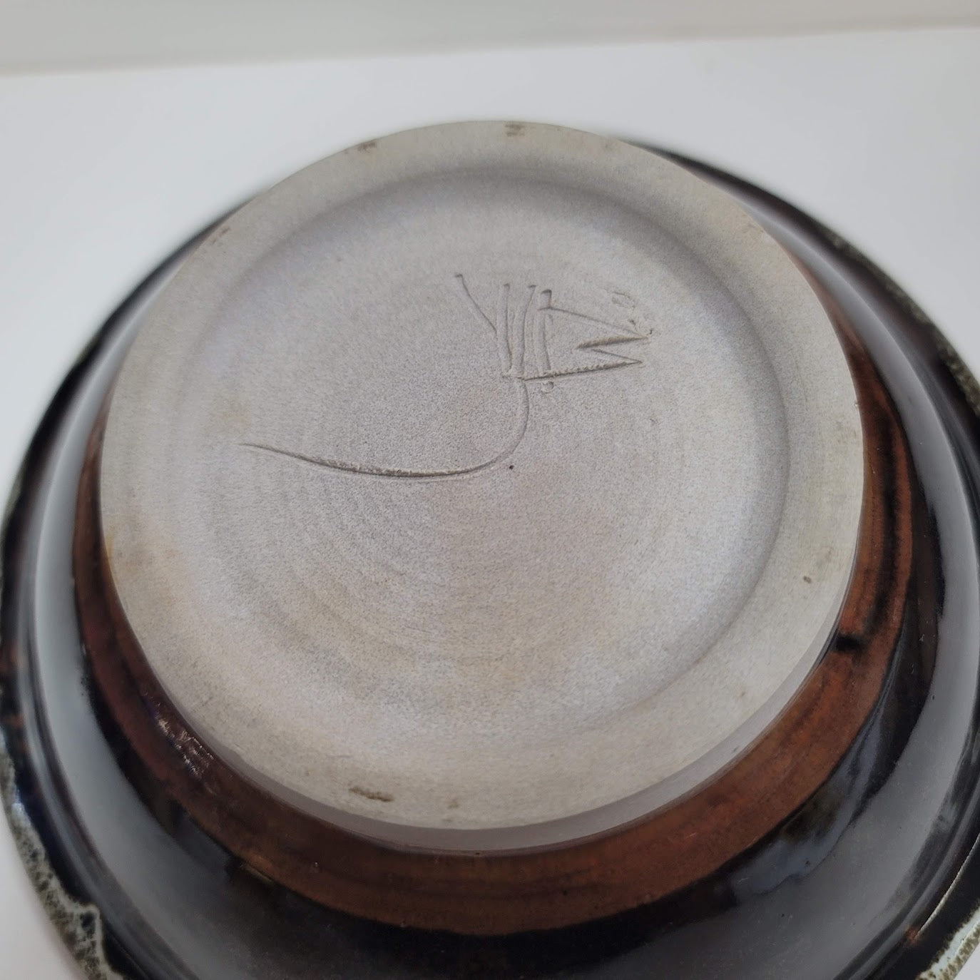 Handmade pottery bown rim brown Signed Salt Glazed Dripware Art Earth tones 8"