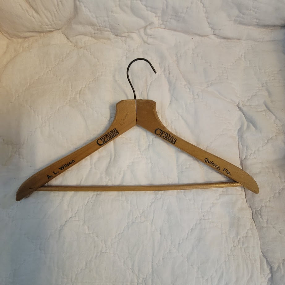 A.L. Wilson Adversting wood clothes hanger Curlee Clothes Quincy, Florida