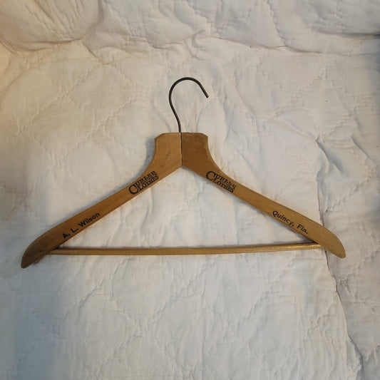 A.L. Wilson Adversting wood clothes hanger Curlee Clothes Quincy, Florida