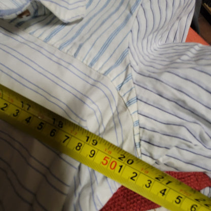 holding horses Size Large Blue white striped babydoll blouse top Anthropologie