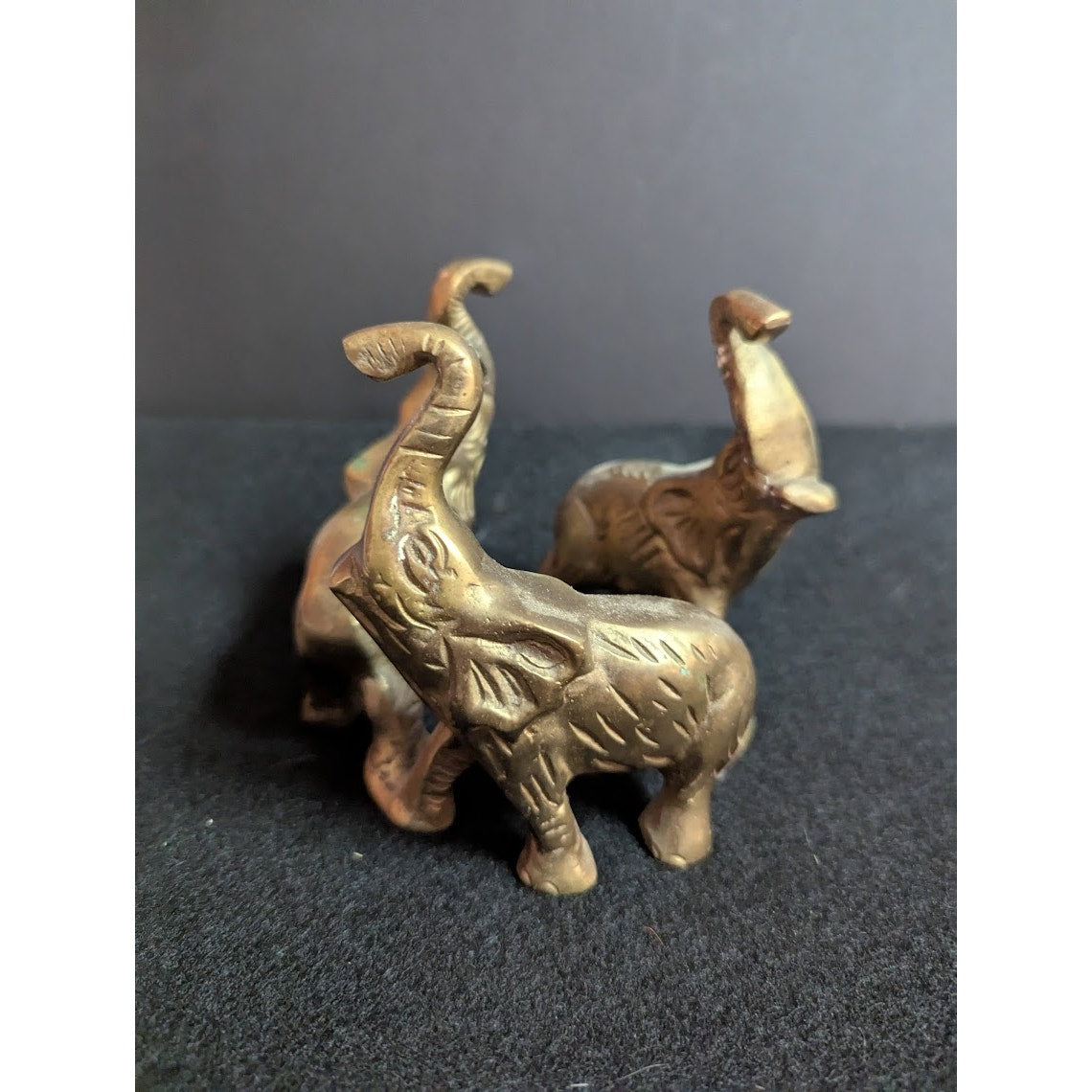 Small vintage bronze ring of 3 elephants trunks raised all attached