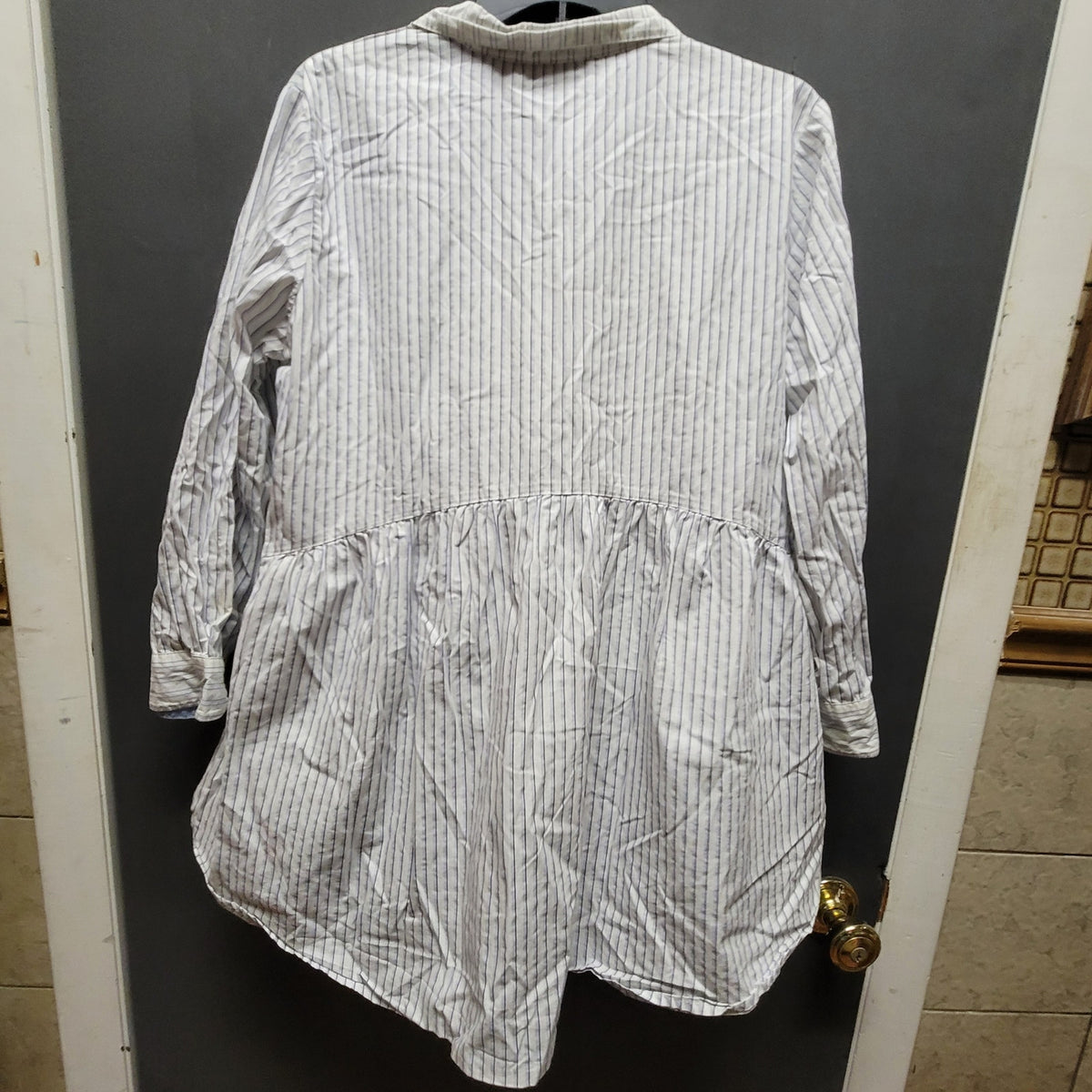 holding horses Size Large Blue white striped babydoll blouse top Anthropologie