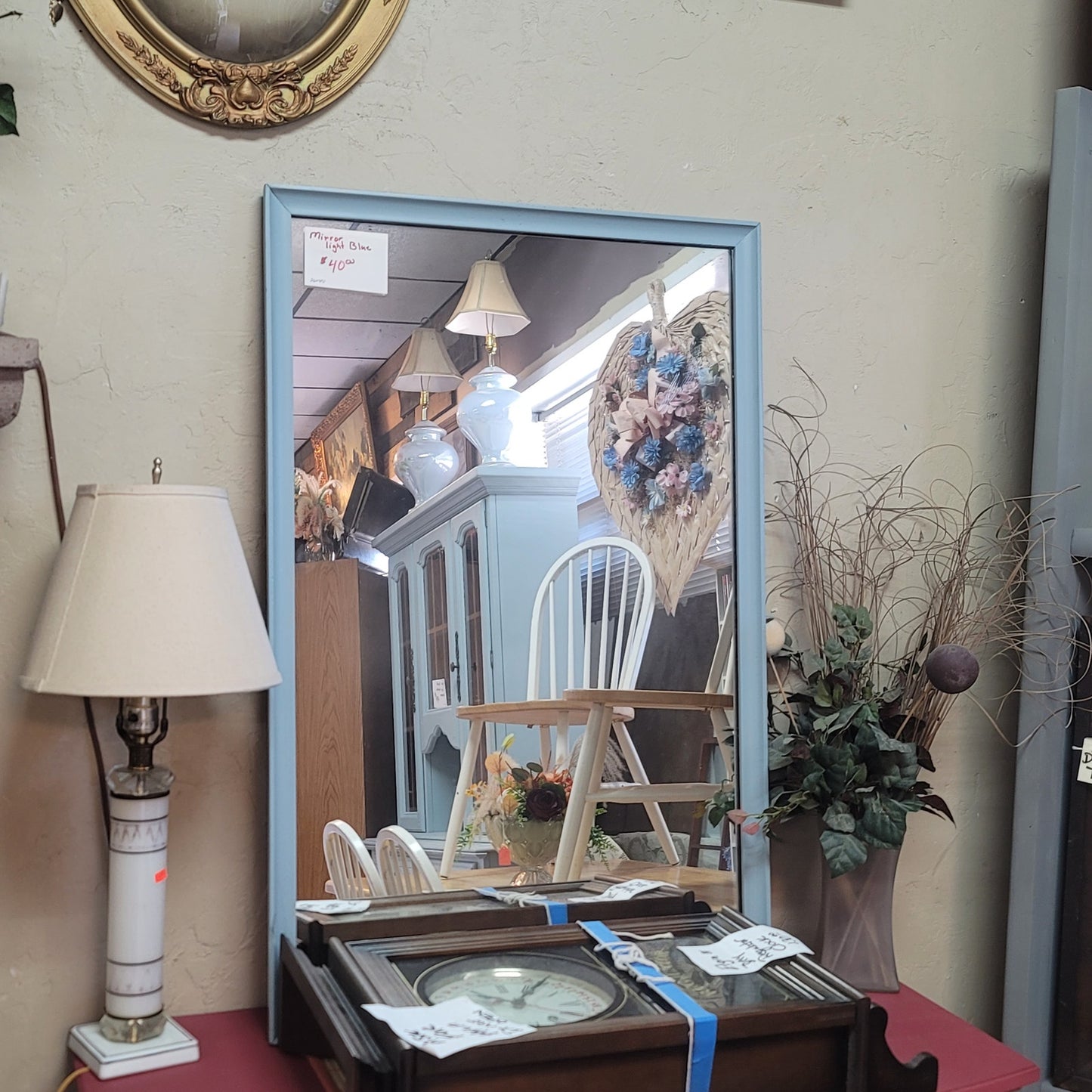 SECONDHAND SANDIES: 24" x 40"  blue framed mirror hang vertical or horizontal