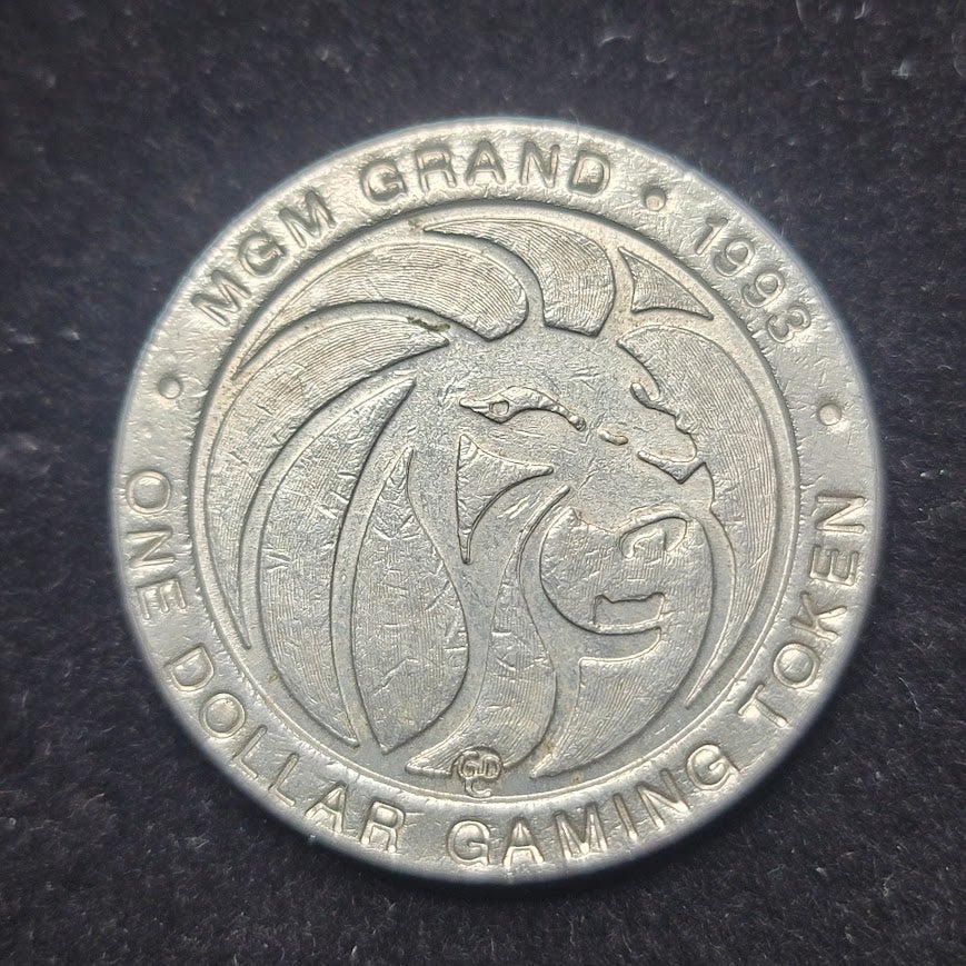 Vintage 1988 MGM Grand Las Vegas One Dollar Casino Slot Gaming Token $1