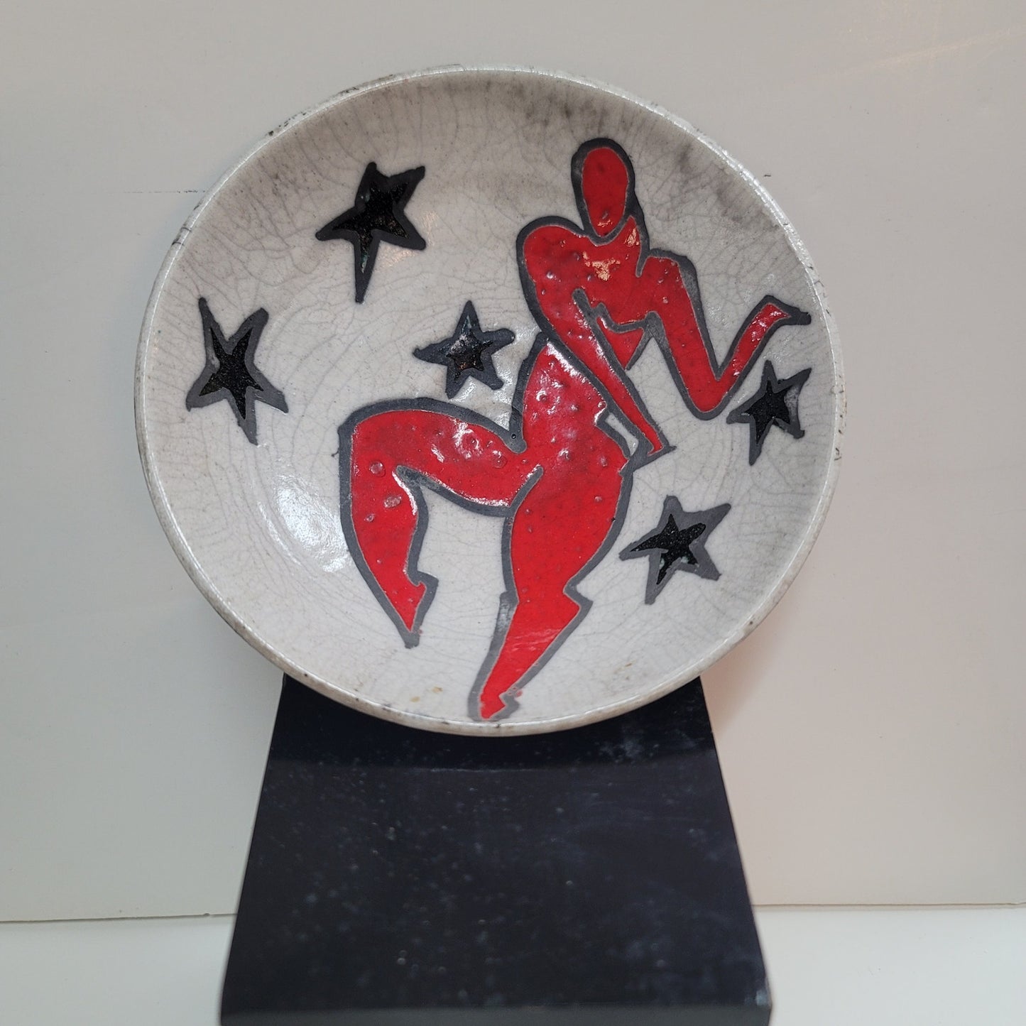 Art pottery female nude red surrounded by stars signed MAB wall decor bowl red