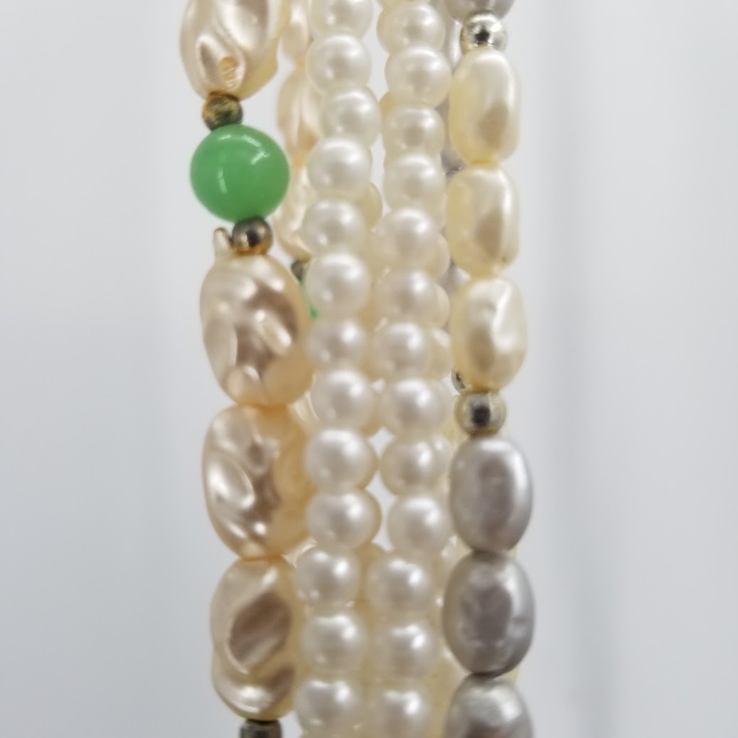 4 strands of necklaces fresh water pearl and small round plastic beads