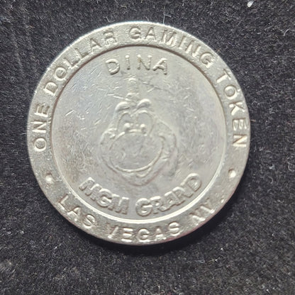 1993 MGM Grand Dina one dollar gaming token Metal Las Vegas NVD