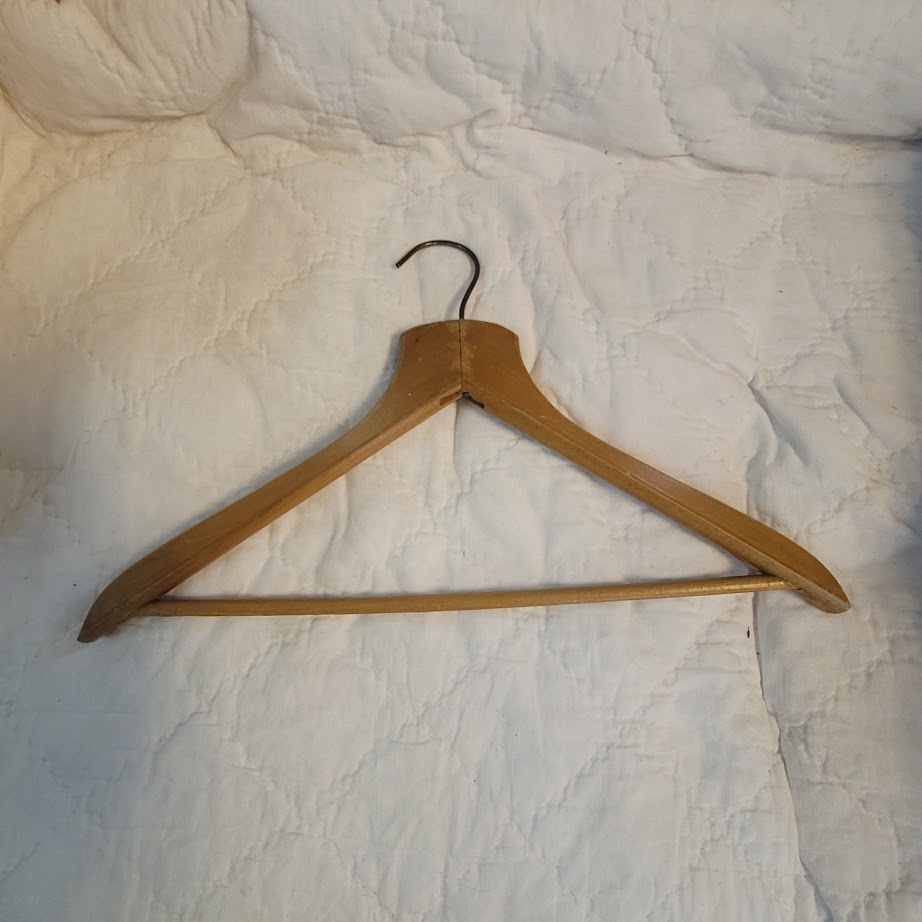 A.L. Wilson Adversting wood clothes hanger Curlee Clothes Quincy, Florida