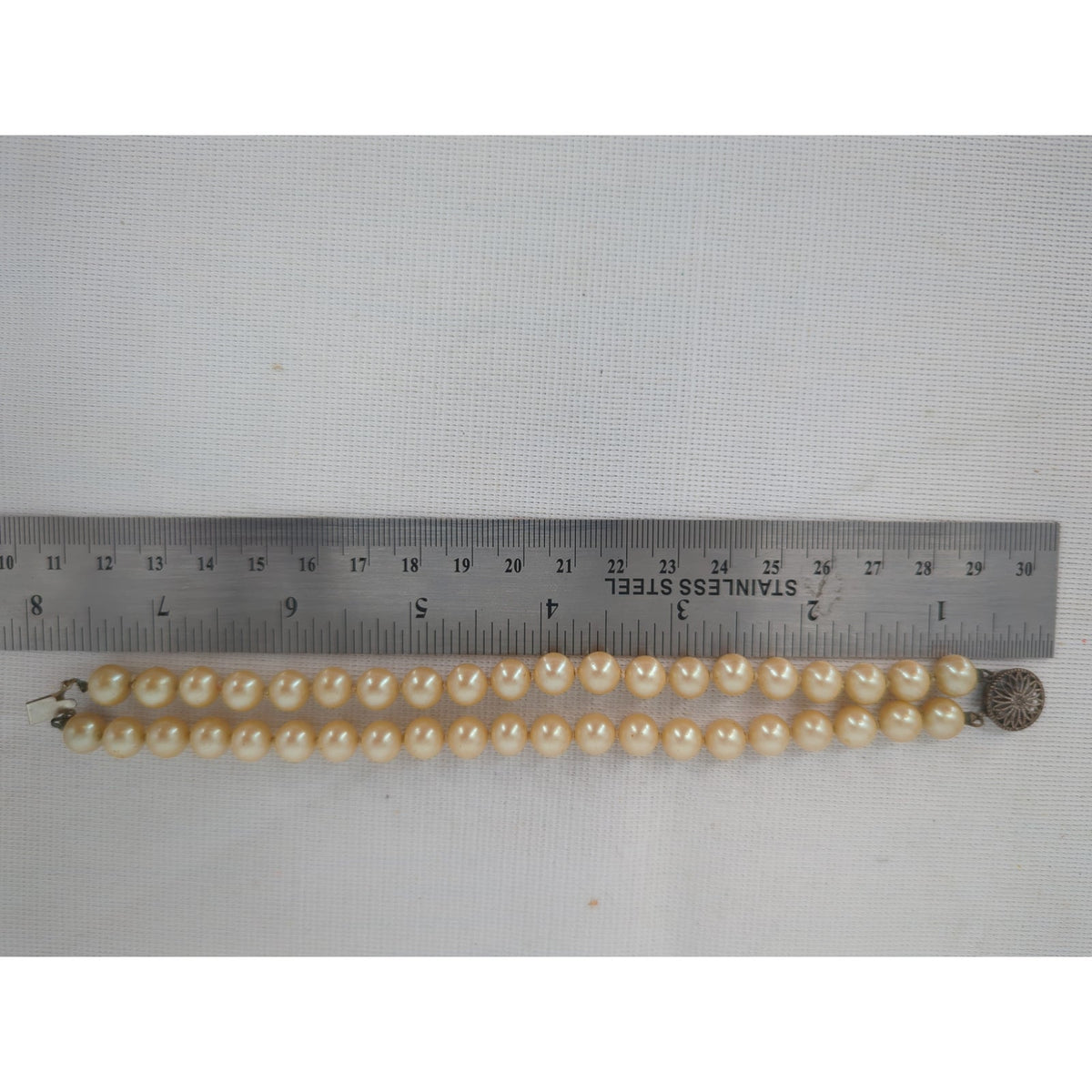 Vintage Double Strand Cream Faux Pearl Bracelet With Filigree Clasp