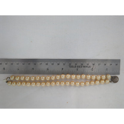 Vintage Double Strand Cream Faux Pearl Bracelet With Filigree Clasp