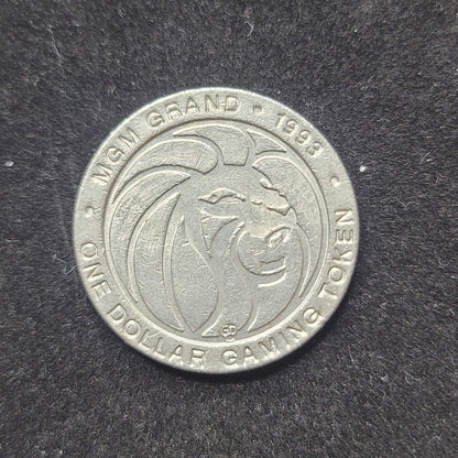 1993 MGM Grand Dina one dollar gaming token Metal Las Vegas NVD