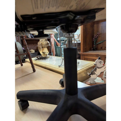 Secondhand Sandies: Small black office chair rolling