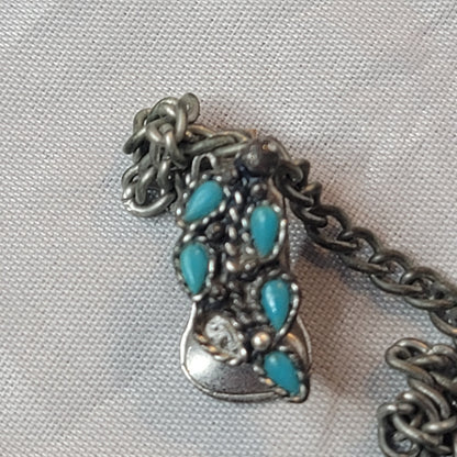 Faux turquoise  silvertone sweater double clip missing one stone