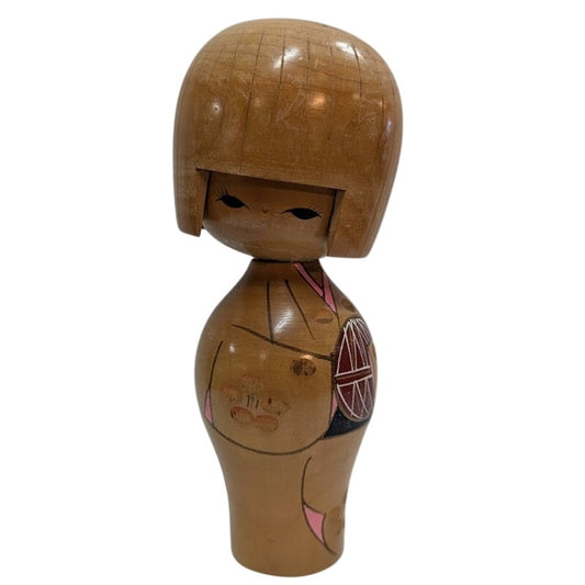 Vintage Japanese Kokeshi Doll Light Wood Colored Hand Painted Holding Red Ball