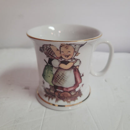 M.J. Hummel Germany Porcelain coffee cup mug white gold rimmed