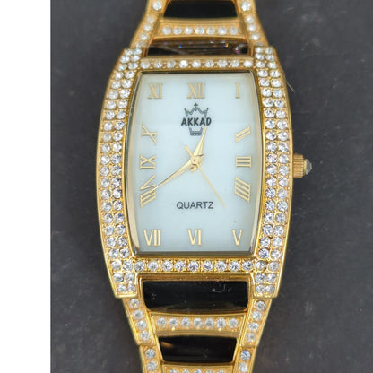 Vintage AKKAD Women's Quartz Watch Gold Tone Rhinestone Link Bracelet Tonneau