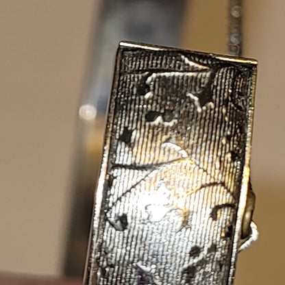 Silvertone bangle bracelet etched safety chain hinged floral floral motif Small