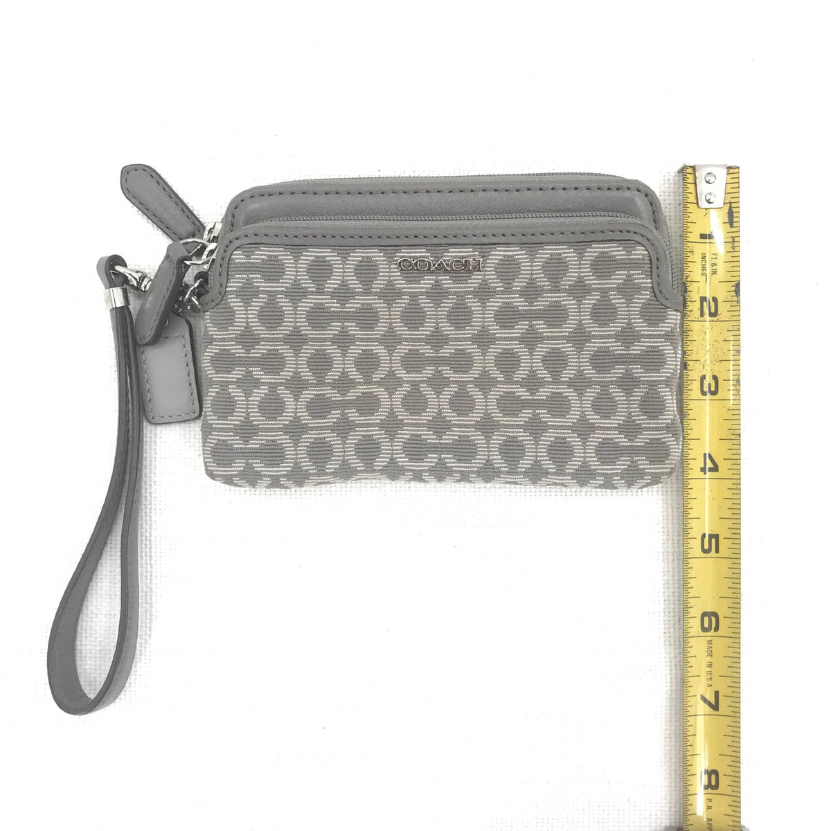 CoachCoach Madison Dotted Op Art Signature Jacquard Wristlet in gray and silver
