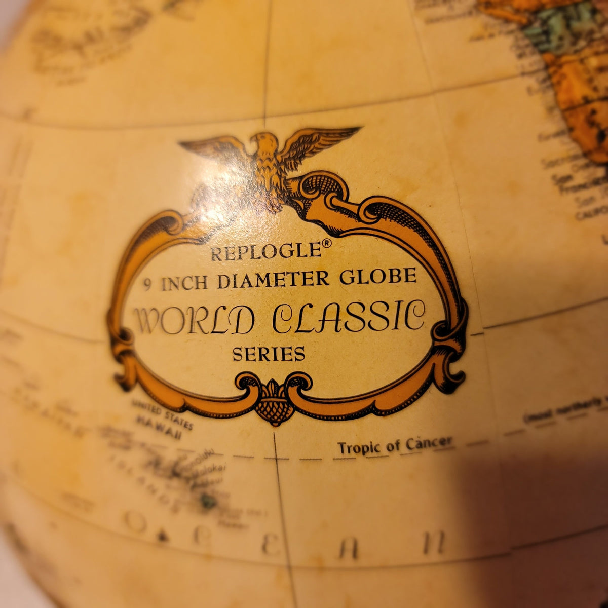 Replogle spins 9" Globe World Classic Wood base cream background map office school