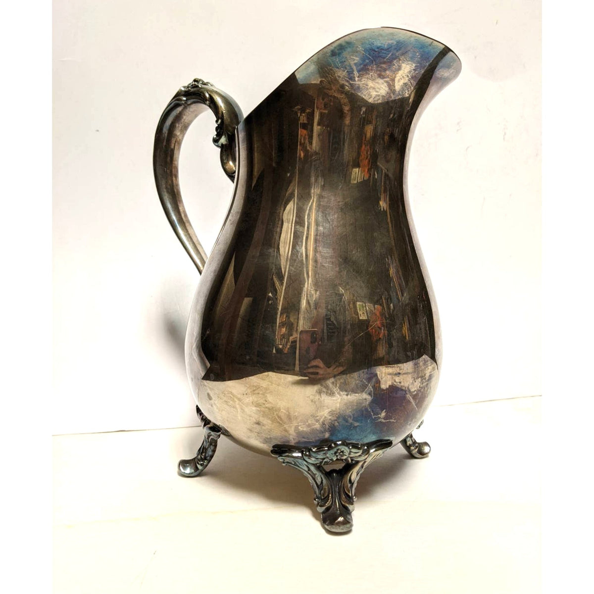 WM Rogers Ornate Plated Silver Stainless Steel 4 Footed Drink Pitcher Ice Lip 317