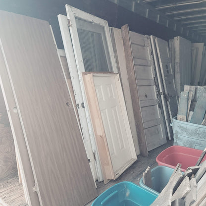 Architectural Salvage Doors and Windows. Many Sizes to dig thru. Come by