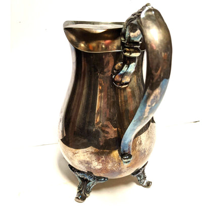 WM Rogers Ornate Plated Silver Stainless Steel 4 Footed Drink Pitcher Ice Lip 317