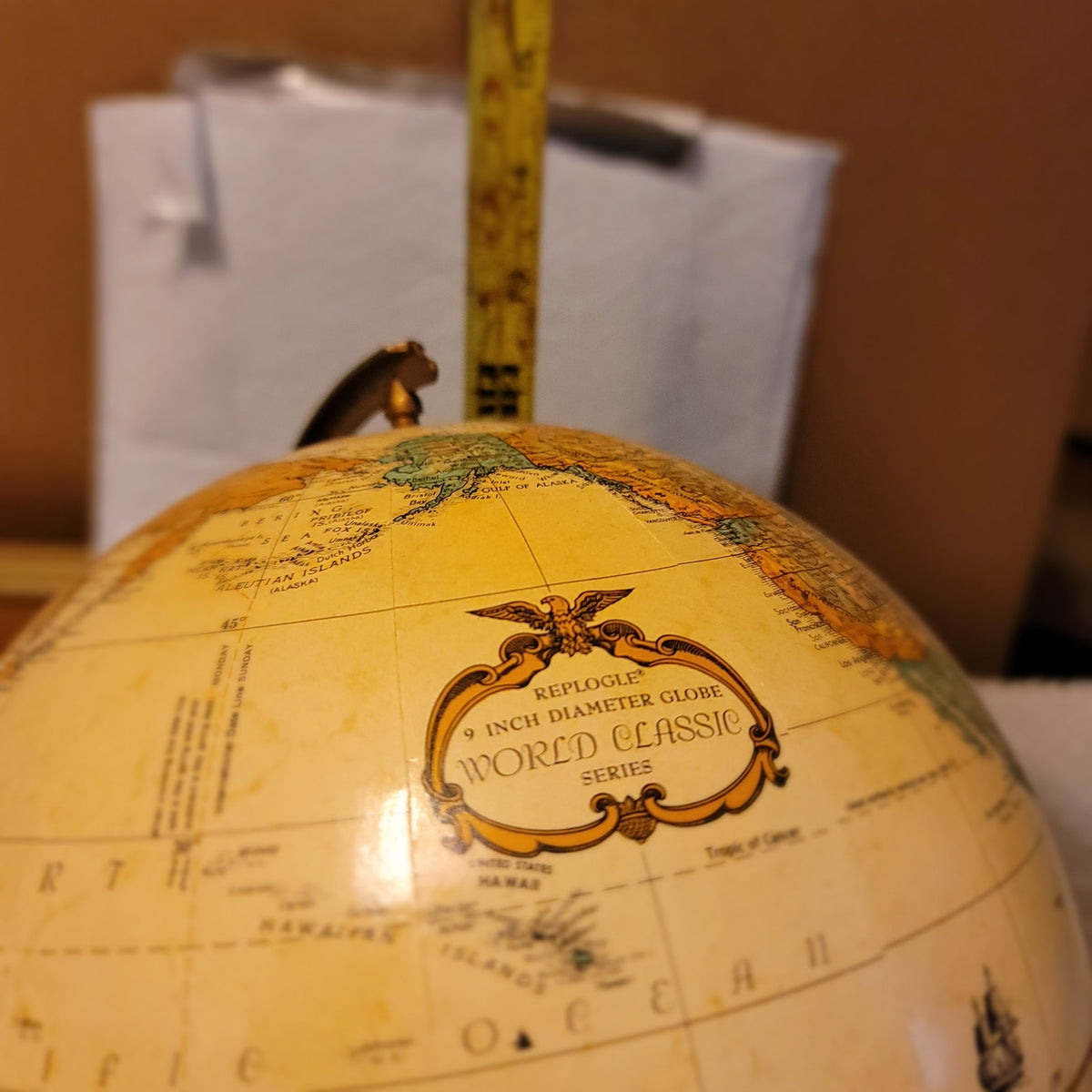 Replogle spins 9" Globe World Classic Wood base cream background map office school