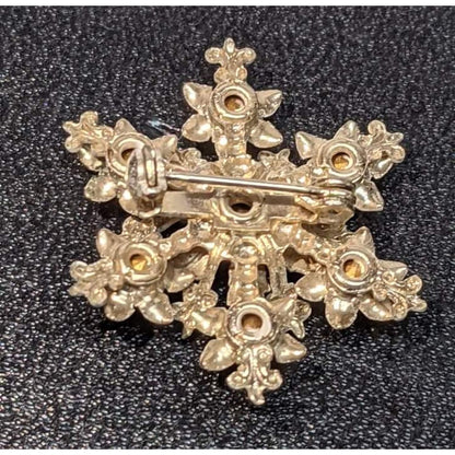 Vintage White Metal Snowflake Rainbow Gems Brooch Pin Starburst Rhinestone